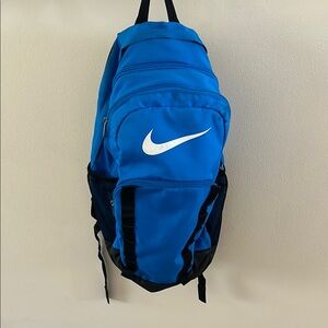 Nike Blue and Black Backpack with Sporty Design.